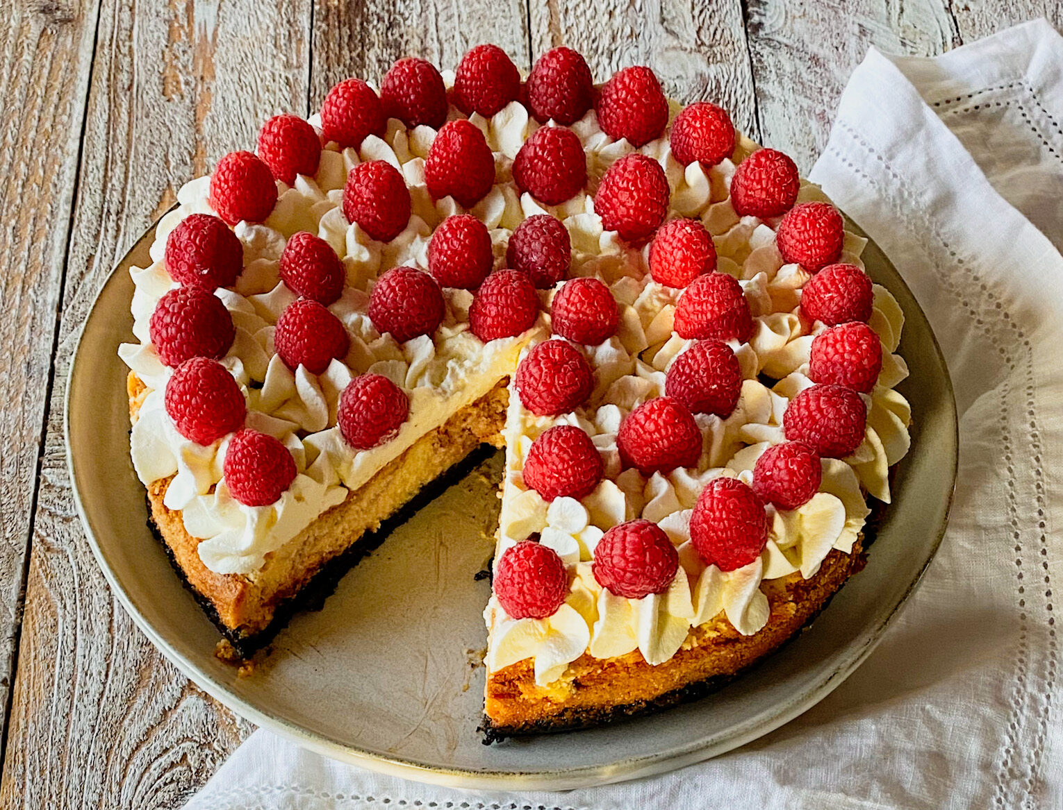 Raspberry Swirl Cheesecake with Chocolate Crust The Perks of Being Us