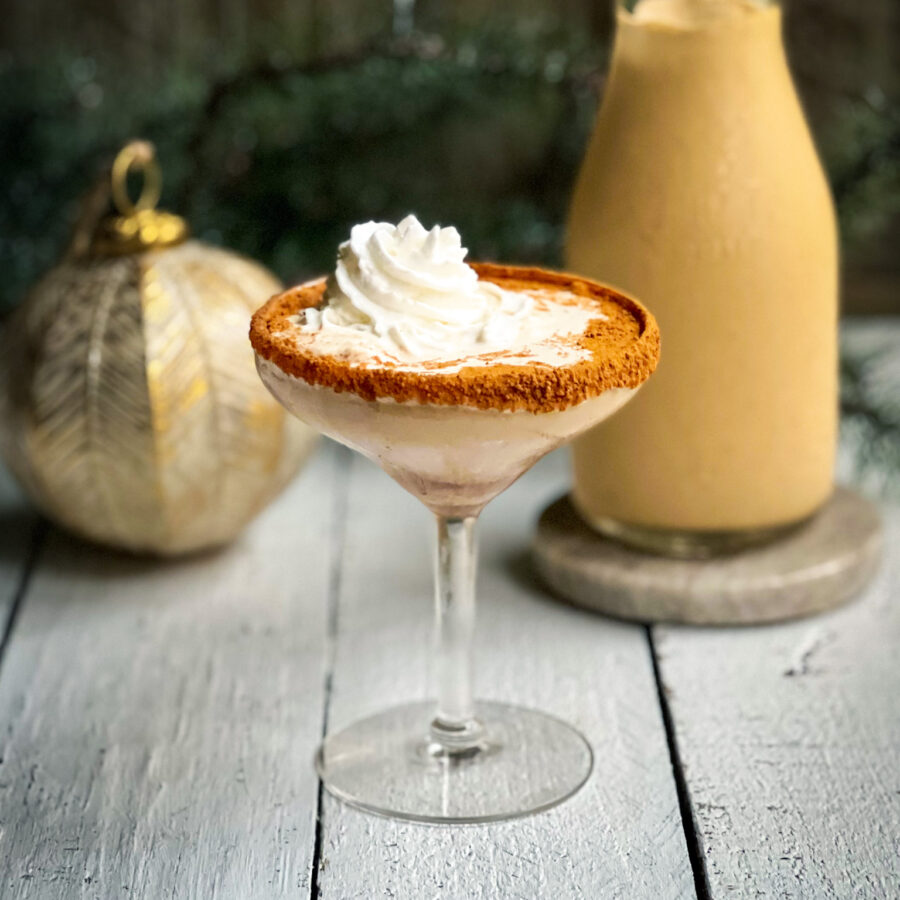 Bourbon Gingerbread Eggnog with whipped cream and eggnog and ornament