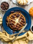 pumpkin spice waffles with butter and maple syrup