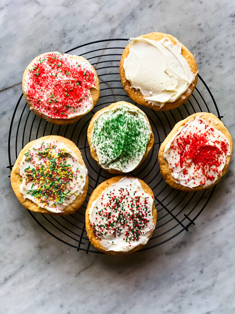 5 vanilla frosted sugar cookies with sprinkles