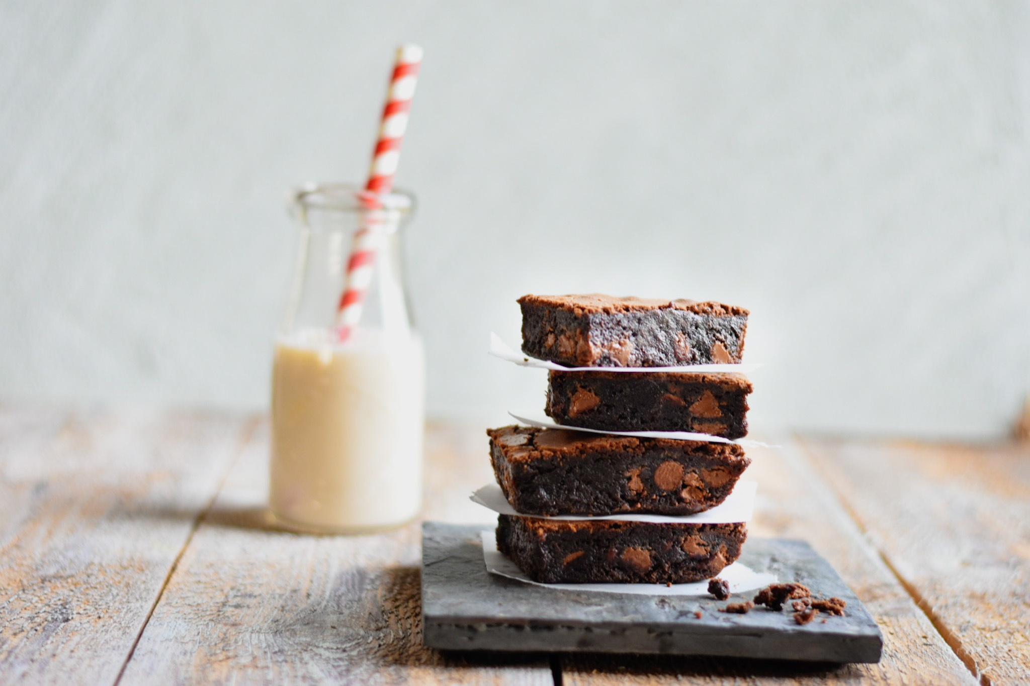 Stack of brownies with bottle of milk with red and white star