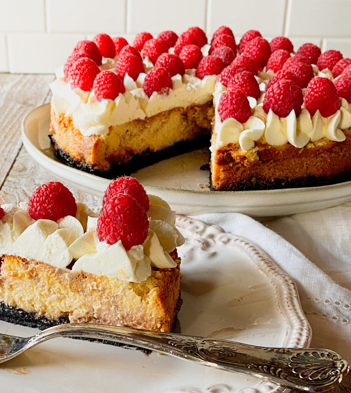 Raspberry Swirl Cheesecake with Chocolate Crust - The Perks of Being Us