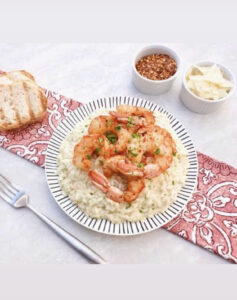 Valentine Dinner of 6 spiced shrimp over risotto with toasted bread, chili flakes and shaved parmesan