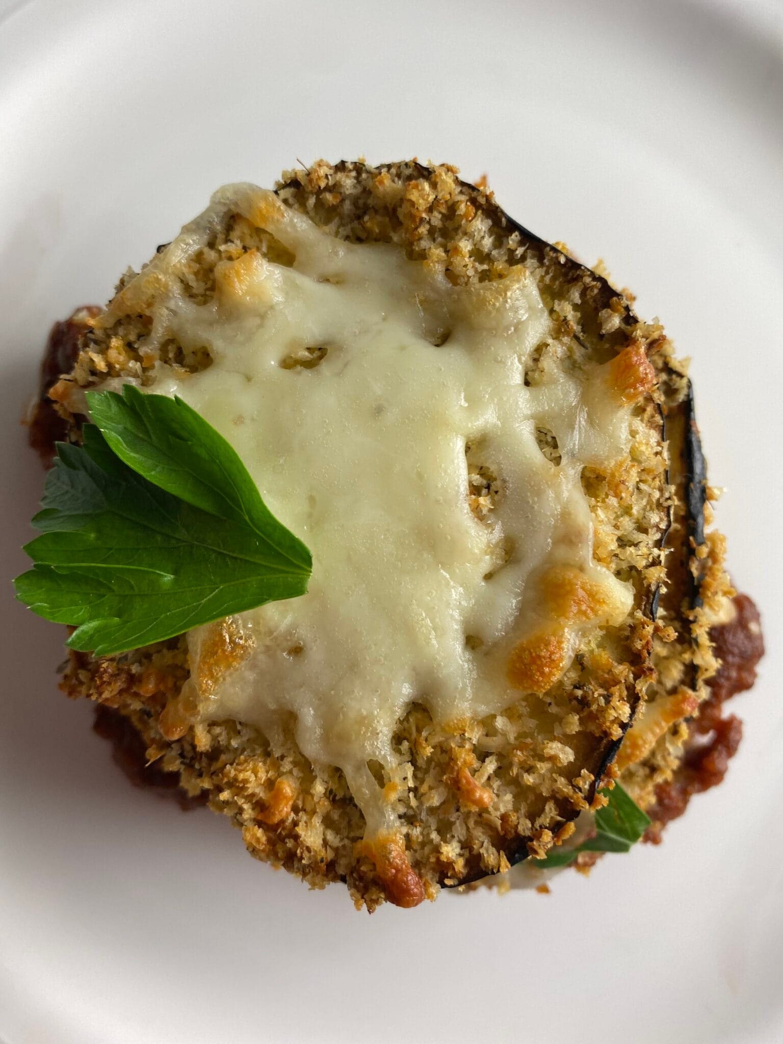 crispy eggplant parm stack on a plate