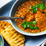 red lentil soup with parsley, grilled sourdough and toasted Aleppo pepper olive oil.