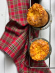 2 Double Cheddar Cheese popovers and a red plaid napkin