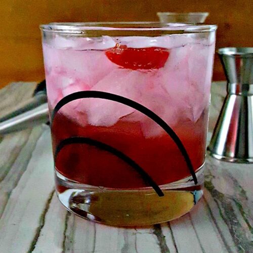 cranberry caipirinha in. glass with ice