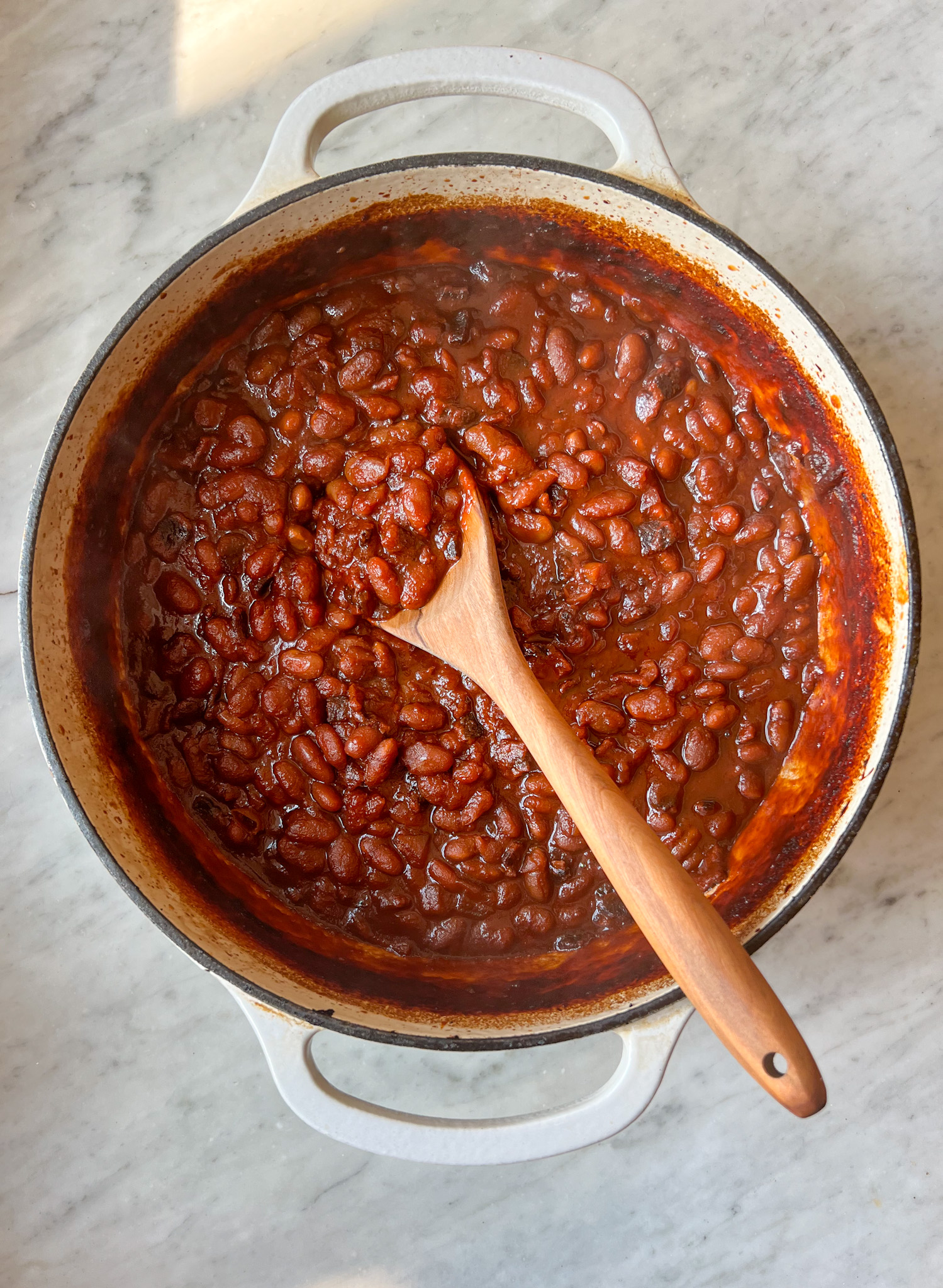 baked beans with a spoon