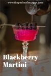blackberry martini being poured into a glass, and blackberries garnished on top