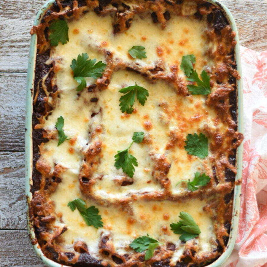 Cheesy lasagna with spinach and sausage