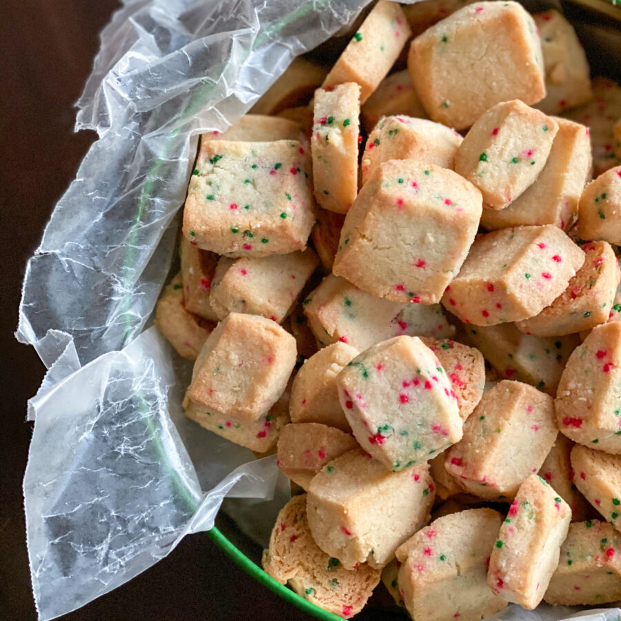 sprinkle funfetti shortbread cookies in a cookie tin