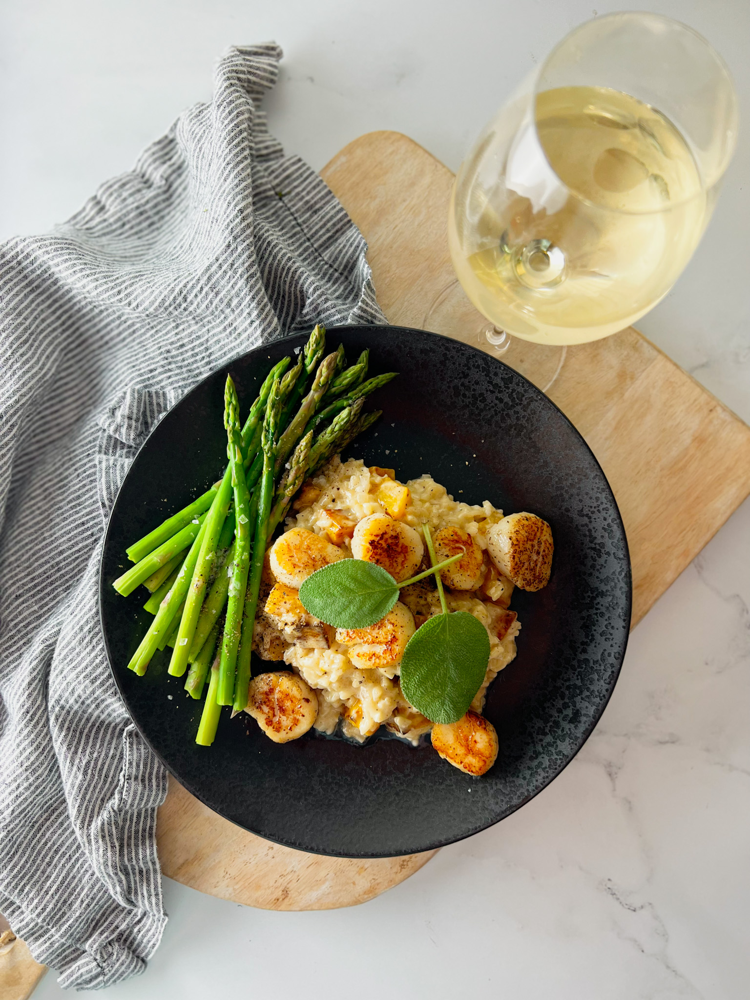 Butternut squash risotto and sage and scallops and asparagus and white wine