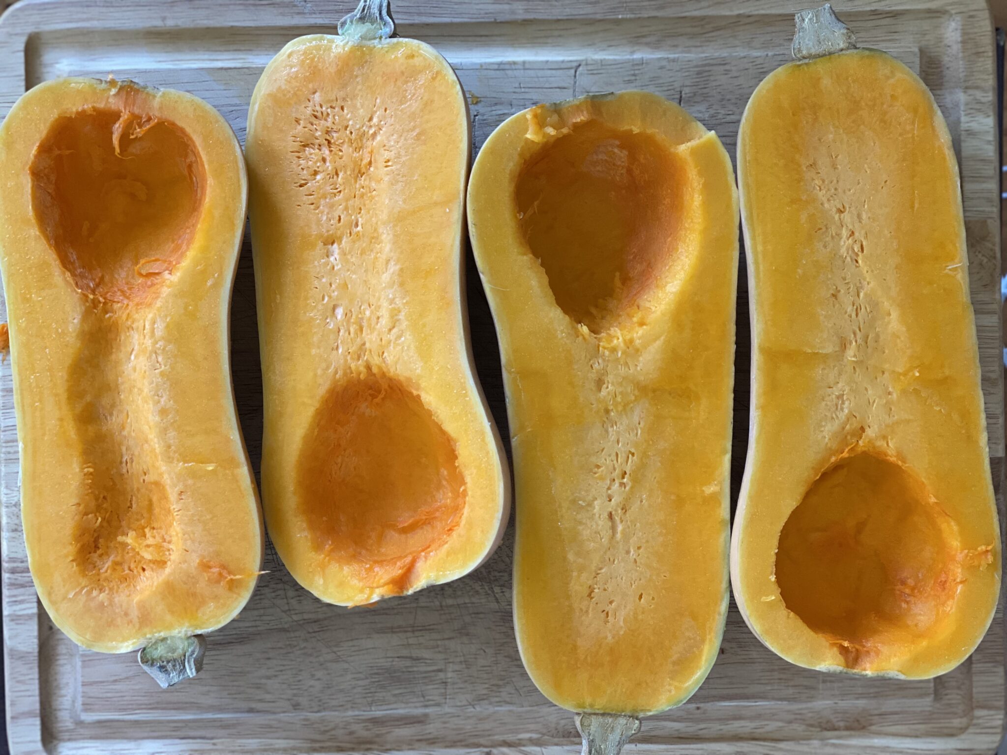 2 butternut squashes sliced in half and seeds removed