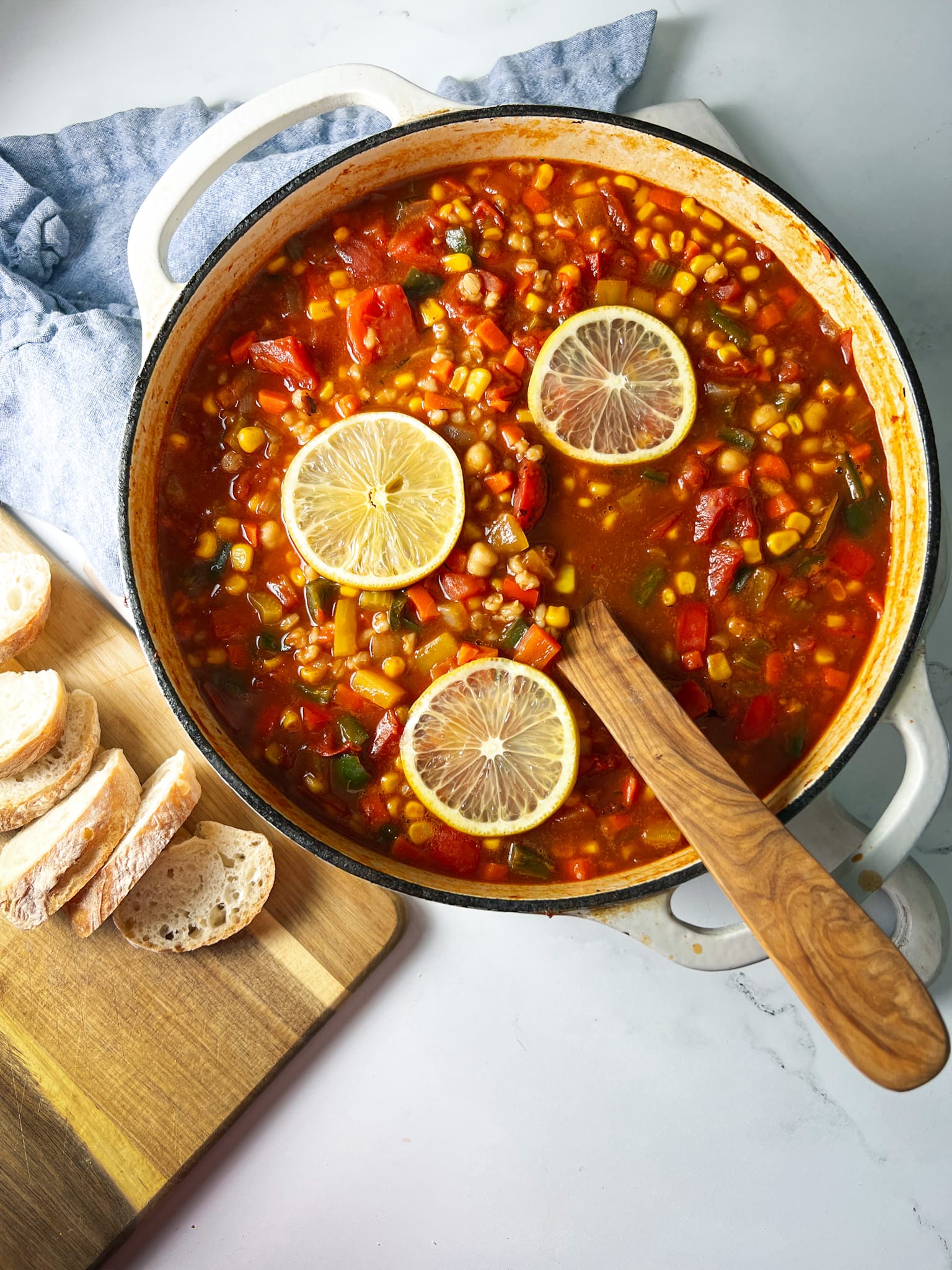 panera 10 vegetable soup in a pot with bread and a spoon