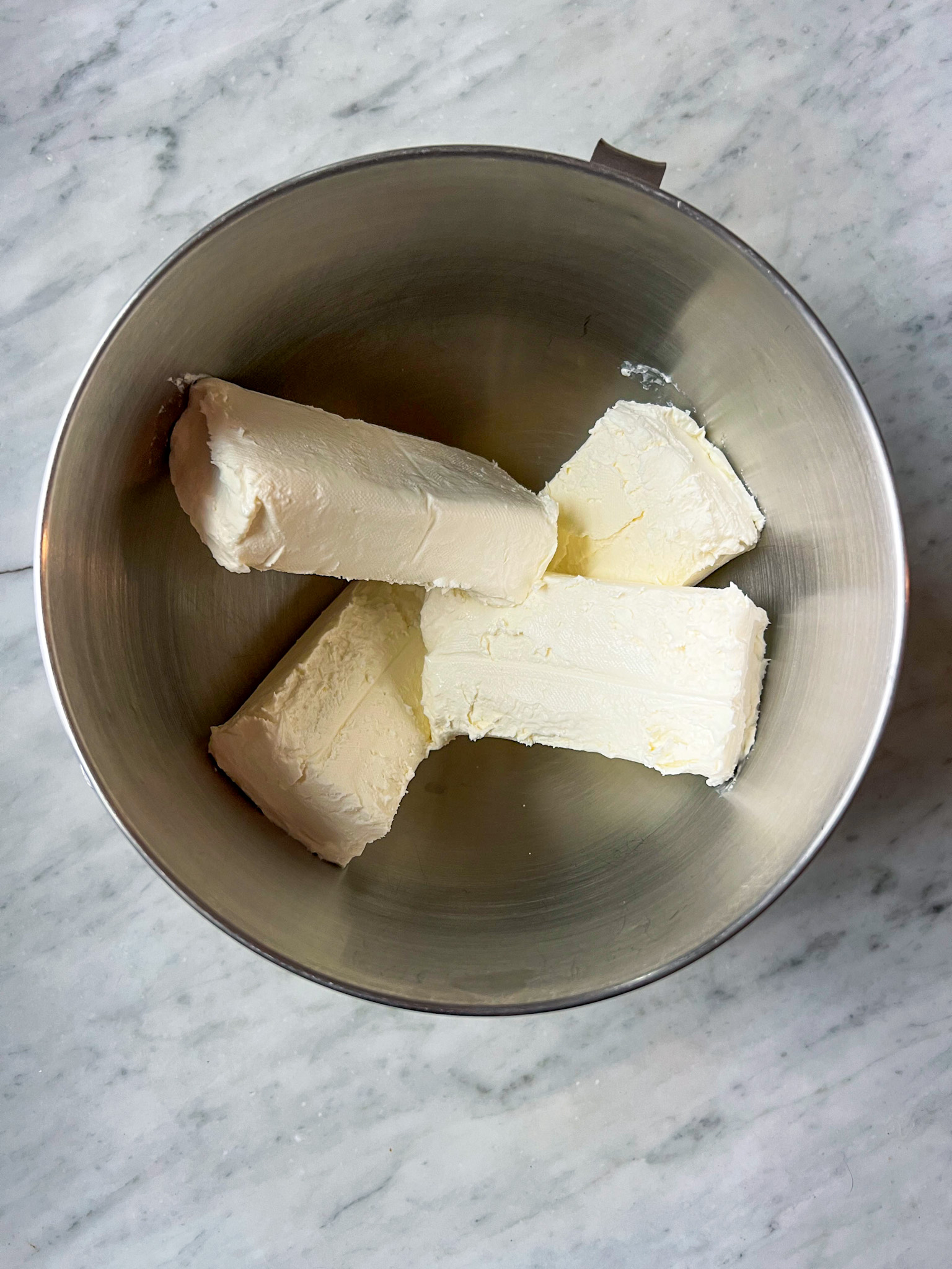 cream cheese in mixer bowl