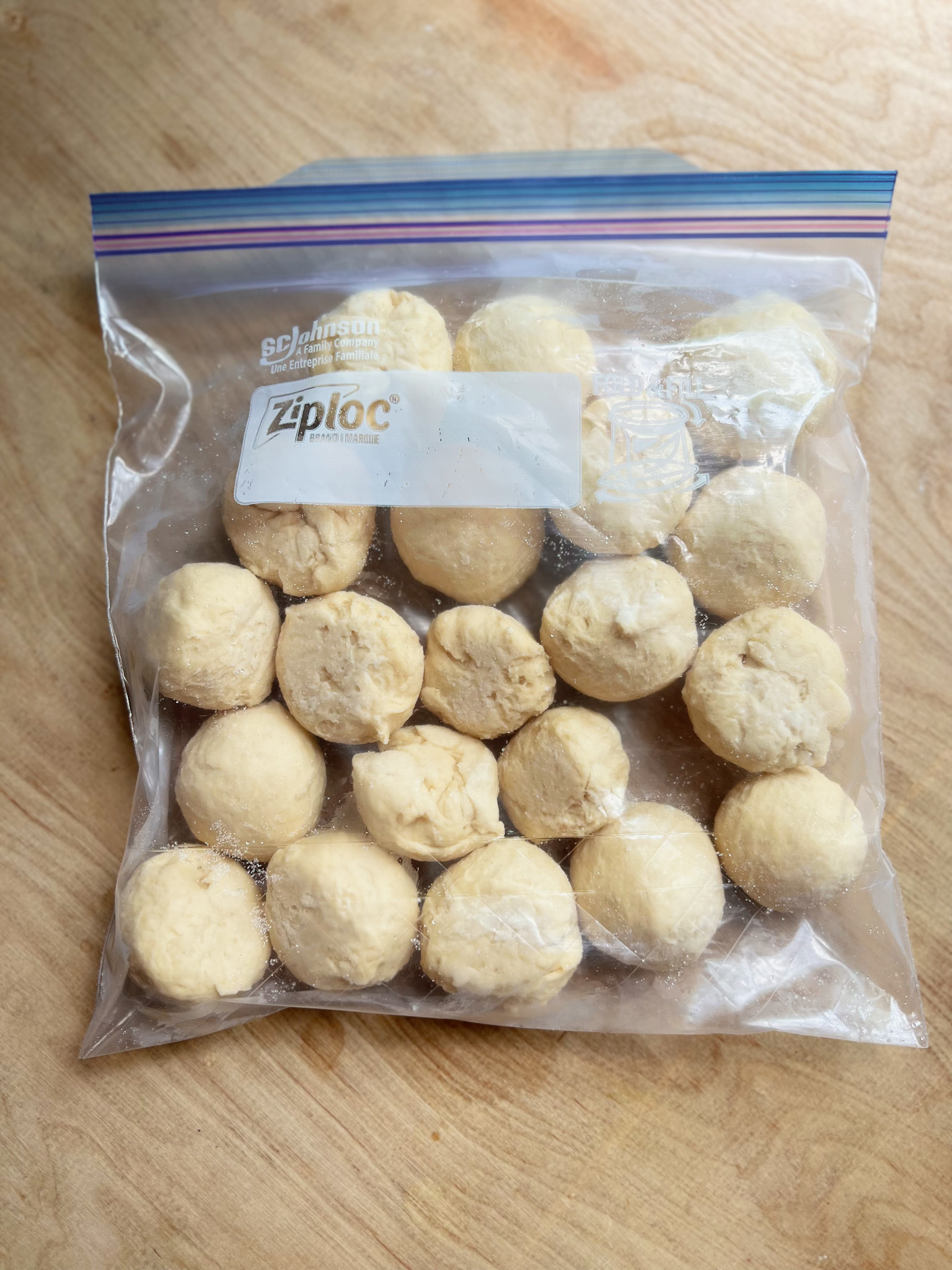 Frozen un-baked yeast rolls in a plastic freezer bag