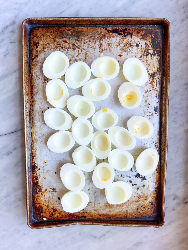 cooked egg whites on cookie sheet