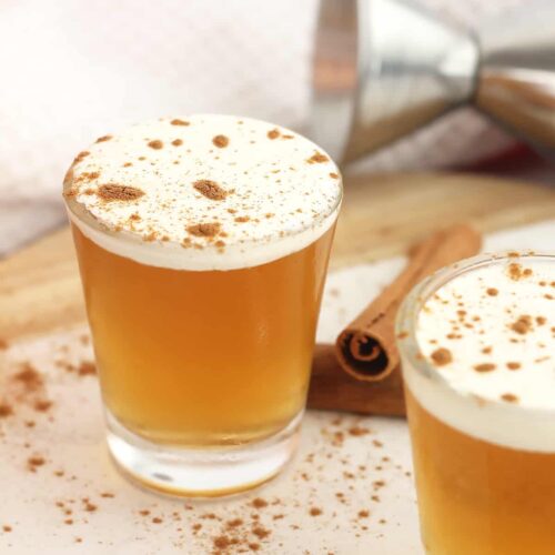 fireball whiskey shot with whipped cream and cinnamon on top