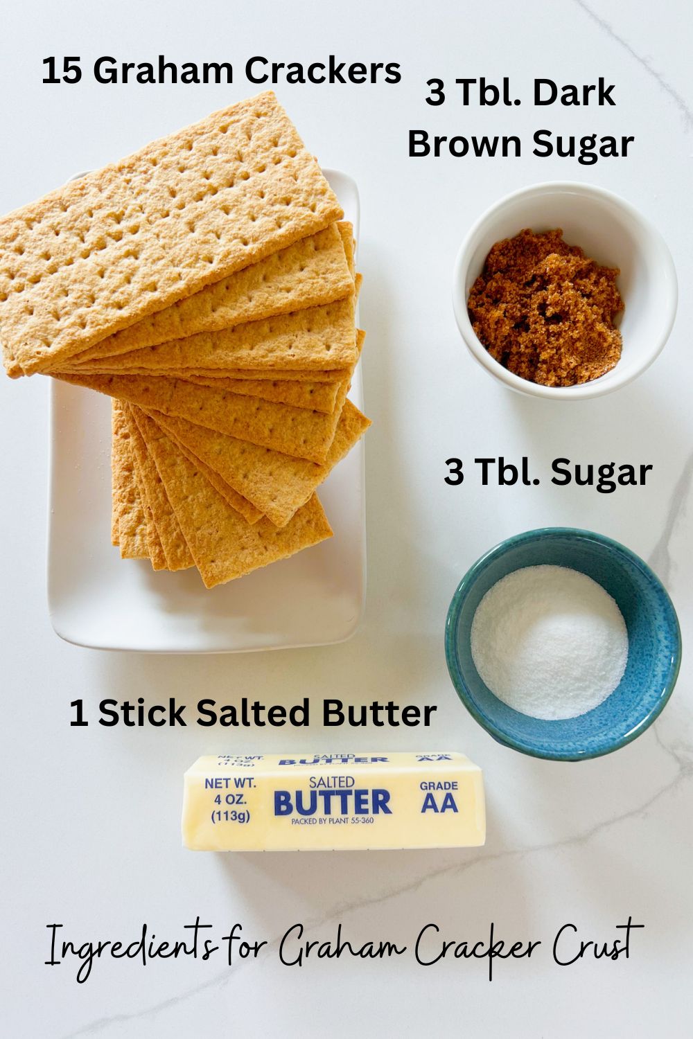 Ingredients for graham cracker crust recipe: graham crackers, brown sugar, white sugar and a stick of salted butter