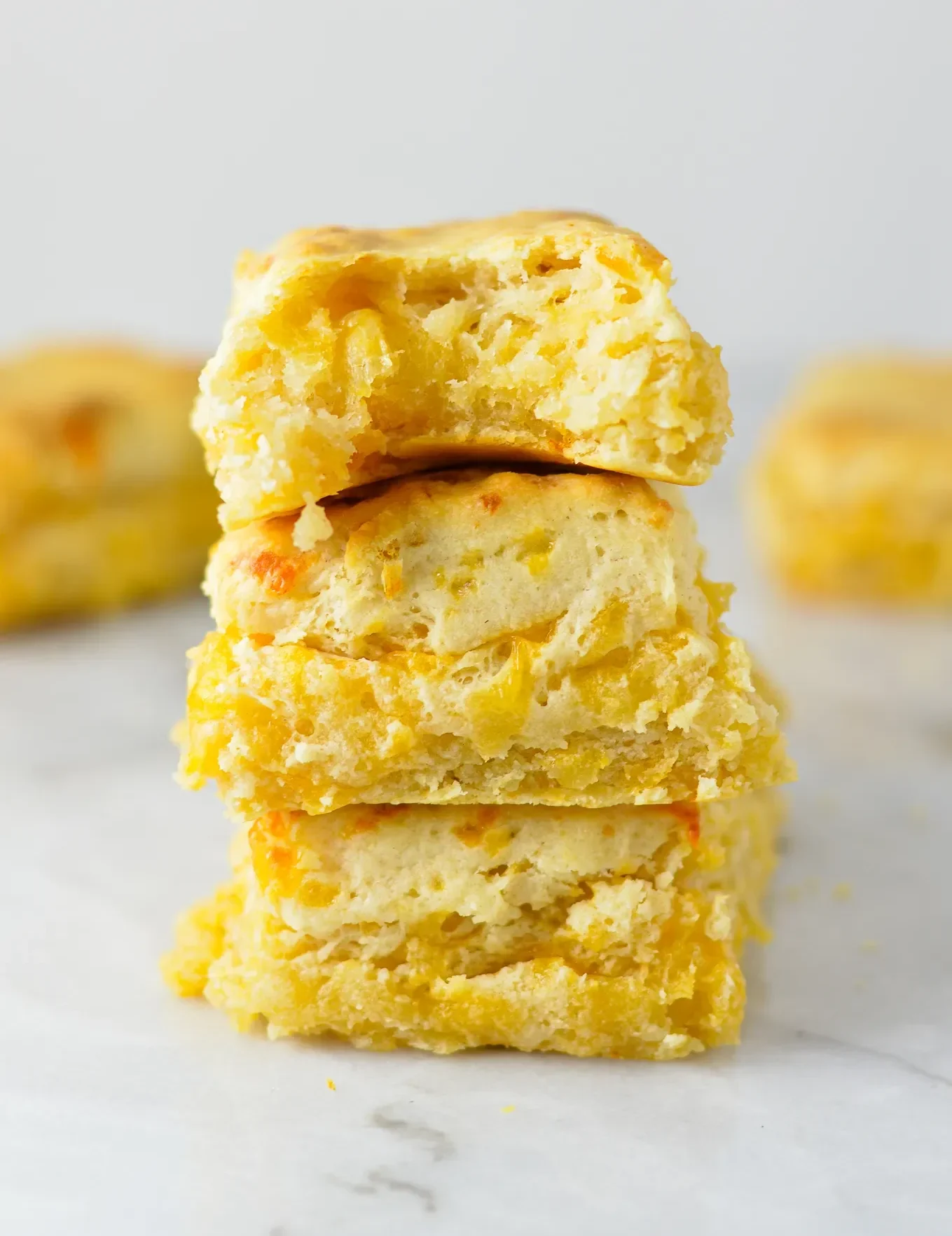 cheddar cream biscuits in a stack